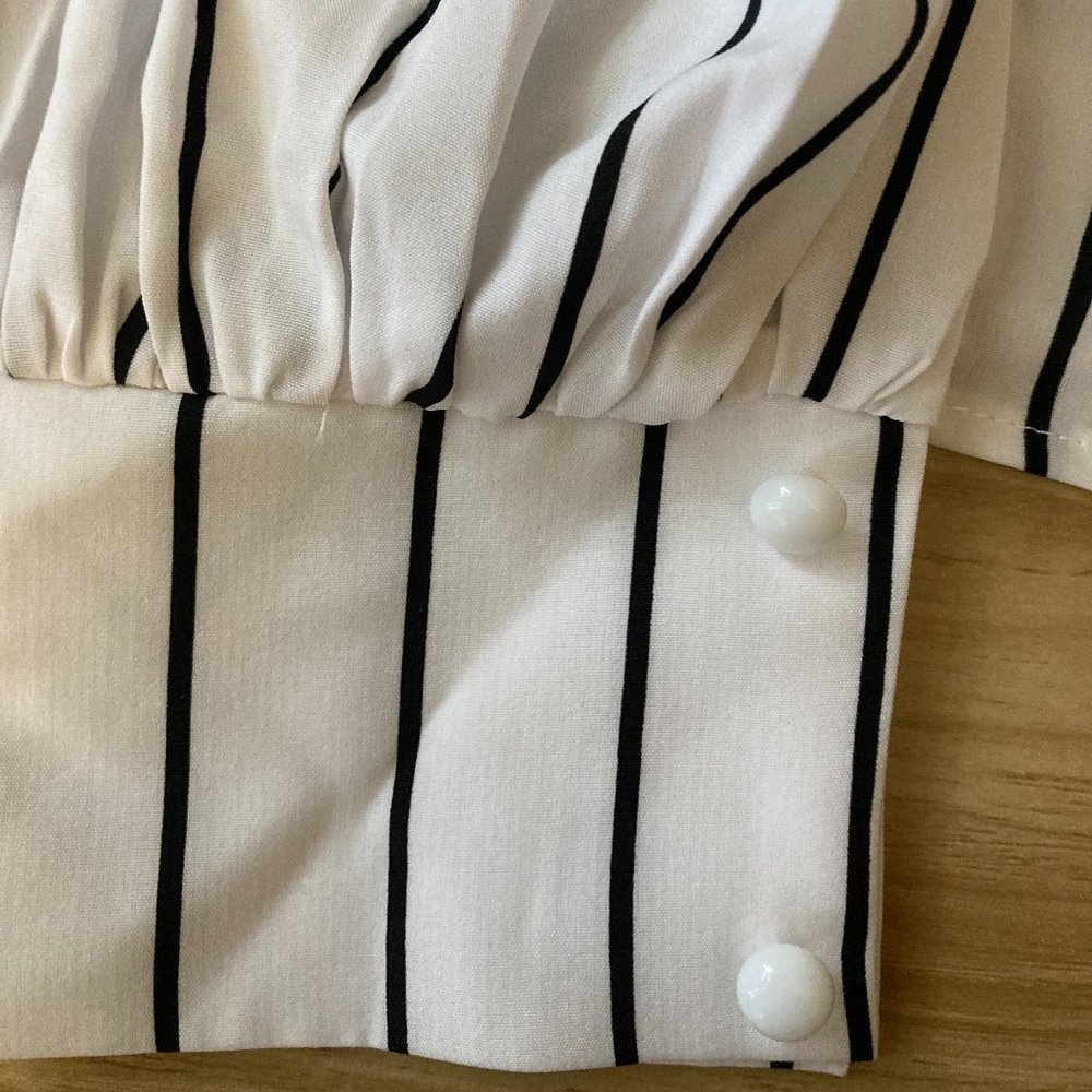 Black and white, plunge neck line long sleeve